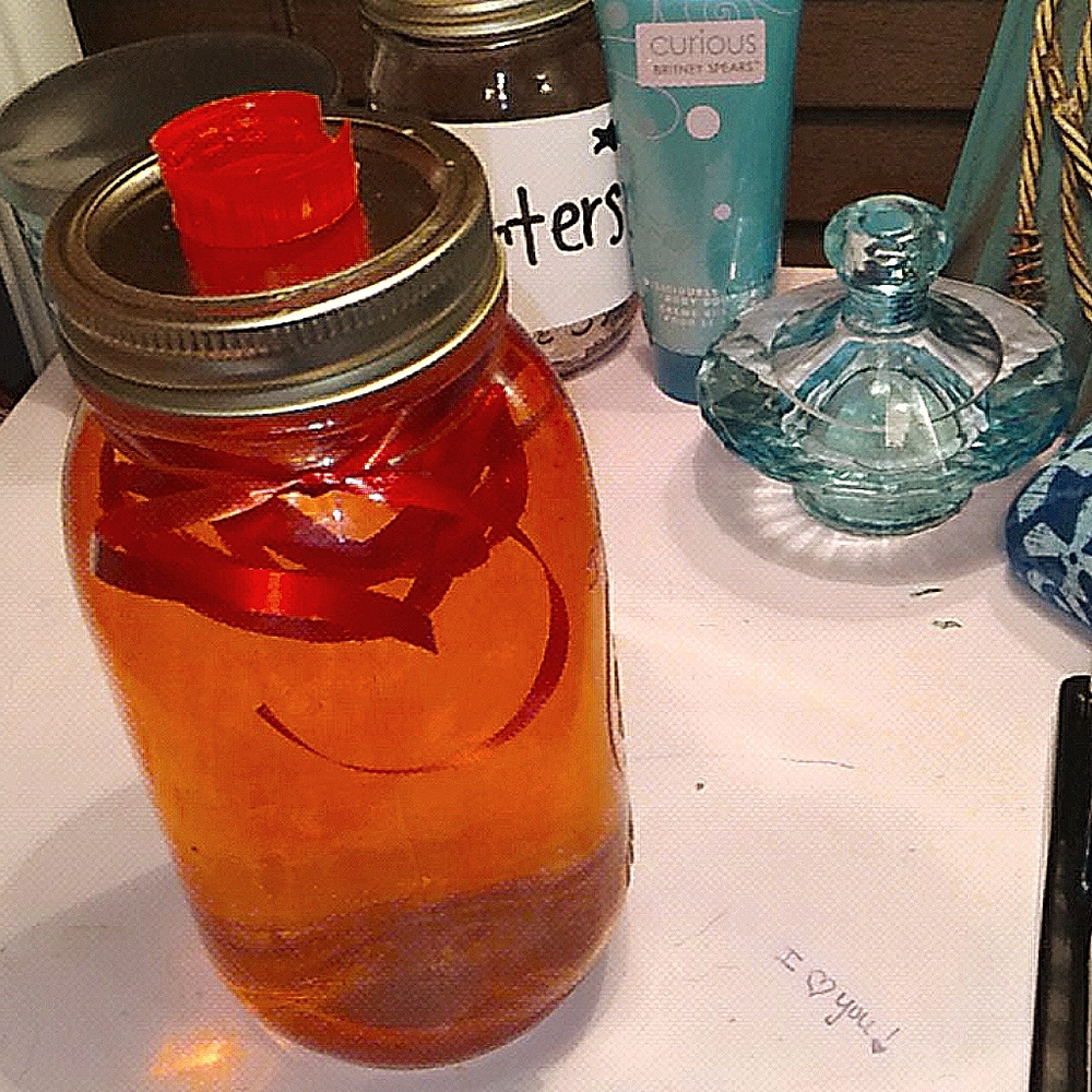 Homemade ribbon globe with phone stand